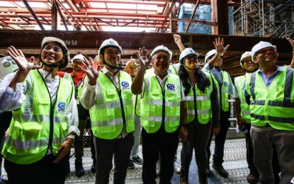 <p><strong>SITE INSPECTION.</strong> Department of Transportation Secretary Jaime Bautista (3rd from left) with other DOTr officials and private contractors during a site visit at the North Ave. Station of the Metro Manila Subway Project Contract Package 101 (CP101) on Thursday (March 7, 2024). Bautista said the project is 40 percent complete and is on track to open for partial operations by 2029. <em>(PNA photo by Joan Bondoc)</em></p>