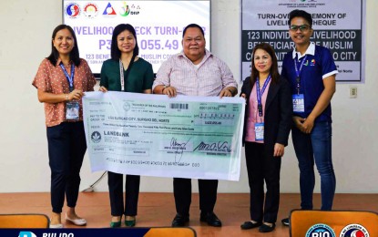 <p><strong>LIVELIHOOD SUPPORT.</strong> The Department of Labor and Employment hands over PHP3.6 million livelihood support fund to Surigao City on Thursday (March 8, 2024). The amount will fund livelihood programs and projects for 123 individuals in the city’s Muslim community. <em>(Photo courtesy of Surigao CIO)</em></p>