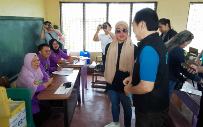 <p><strong>PLEBISCITE.</strong> Commission on Elections (Comelec) Commissioner in Charge of Plebiscites Aimee Ferolino (center, wearing shades) oversees the poll in Marawi City on Saturday (March 9, 2024). The plebiscite will create three new barangays: Sultan Corobong, Sultan Panoroganan, and Angoyao. <em>(Photo from Comelec)</em></p>
<p class="p2"> </p>
<p class="p2"> </p>