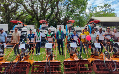 <p><strong>MODERN TECH</strong>. Farmers receive agricultural machines under the Rice Competitiveness Enhancement Fund mechanization program in Kidapawan City on Feb. 29, 2024. The Philippine Center for Postharvest Development and Mechanization on Sunday (March 10) said 6,385 farmers cooperatives and associations and 368 local government units with an aggregate 1 million members have received equipment since the mechanization program started in the middle of 2019. <em>(Photo from PHilMech website)</em></p>