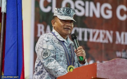 <p><strong>BOOSTING RESERVE FORCE.</strong> Philippine Navy chief Vice Admiral Toribio Adaci Jr. delivers his speech during the closing rites for the completers of the Basic Citizen Military Course in Basco, Batanes on March 9, 2024. A total of 119 Ivatan volunteers joined the Navy's reserve force and are expected to boost maritime security in the country's northernmost province. <em>(Photo courtesy of the Philippine Navy)</em></p>