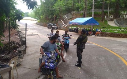 <p><strong>CHECKPOINT</strong>. Cops man a checkpoint near the Nueva Era Eco Park in this undated photo. To prevent forest fires, anyone going to the mountains needs to register his details at designated checkpoints. <em>(Photo courtesy of the Ilocos Norte 2nd PMFC)</em></p>