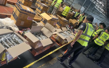 <p><strong>BUSTED.</strong> Customs officers account for the balikbayan boxes inspection that were found containing kush or high-grade marijuana at the Manila International Container Port (MICP) on March 8, 2024. The BOC on Tuesday (March 12) said the inspection yielded a total of PHP238.2 million worth of kush found in 12 balikbayan boxes from Thailand. <em>(Photo courtesy of BOC)</em></p>