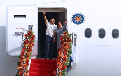 <p><strong>OFF TO WORK</strong>. President Ferdinand R. Marcos Jr. and First Lady Liza Araneta-Marcos wave to well-wishers at Villamor Air Base in Pasay City on March 11, 2024. The President held a working trip to Germany until March 13 and proceeded to a state visit to the Czech Republic from March 14 and 15 upon the invitation of his counterparts.<em> (PNA photo by Joan Bondoc)</em></p>