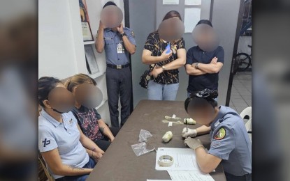 <p><strong>CAUGHT.</strong> Two women, identified only as "Sally" and Kath" were caught Tuesday (March 12, 2024) trying to smuggle in 250 grams of shabu inside a Bureau of Jail Management and Penology (BJMP) detention center in Antipolo City. They are believed to be "mules" of a drug ring operating inside the city's penal system. <em>(Photo courtesy of the Antipolo City Police Station)</em></p>