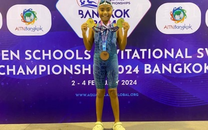 <p><strong>SWIMMING PRODIGY</strong>. Albay swimming phenom Mattea Xaria Gonzales from Tabaco town proudly shows off her medals during the Asian Open Swim Invitational Aquatic Championship in Bangkok, Thailand on Feb. 2-4, 2024. She won two gold medals in the 4 x 50 freestyle relay and 4 x 50m medley relay and a bronze in the 50m freestyle event. <em>(Photo from Albay Governor Edcel Grex Lagman's Facebook page)</em></p>