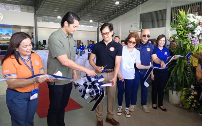 <p dir="ltr"><strong>EVACUATION HUB</strong>. Mayor Javier Miguel Benitez and Department of the Interior and Local Government Secretary Benjamin Abalos Jr. (2nd and 3rd from left) lead the ribbon cutting and inauguration rites for the PHP55-million Victorias City Command and Evacuation Center in Negros Occidental on Thursday (March 14, 2024). They were joined by (from left) Office of Civil Defense -Western Visayas Disaster Risk Reduction and Management Division chief Aletha Nogra, DILG Assistant Secretary Elizabeth Lopez De Leon, DILG-Western Visayas Regional Director Juan Jovian Ingeniero and DILG-Negros Occidental Provincial Director Teodora Sumagaysay. <em>(PNA photo by Nanette L. Guadalquiver)</em></p>