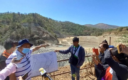 <p><strong>INSPECTION</strong>. Engineer John Molano, National Irrigation Administration-Pangasinan Irrigation Management Office (PIMO) Division Manager, and some journalists conduct a site inspection on Thursday (March 14,2024) at the Dumuloc Small Reservoir Irrigation Project located in the village of Cayanga in Bugallon town. The NIA said it is implementing measures to help the farmers cope with the El Niño phenomenon. <em>(Photo by Liwayway Yparraguirre)</em></p>