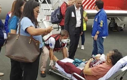 <p><strong>BACK HOME.</strong> The two remaining Filipino seafarers who suffered serious injuries after a Houthi missile hit their ship M/V True Confidence on March 6 arrive via an air ambulance at Ninoy Aquino International Airport on Thursday (March 14, 2024). The injured seafarers were immediately taken to a hospital where they will continue recovery. <em>(Photo from OWWA Facebook page)</em></p>