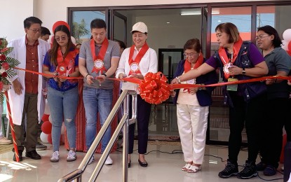 <p><strong>NEW HEALTH FACILITY.</strong> Claver Mayor Georgia Gokiangkee (4th left) and Surigao del Norte Vice Gov. Eddie Gokiangkee (3rd from left) lead the inauguration of the PHP6.5 million super health center in Barangay Taganito on Wednesday (March 13, 2024). The health facility is equipped with advanced equipment worth PHP5 million and is expected to serve thousands of residents in the town. <em>(PNA photo by Alexander Lopez)</em></p>