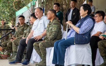 <p><strong>MITIGATING EL NIÑO</strong>. Defense Secretary Gilberto Teodoro Jr. (in white shirt) graces the launch of the “Gift of Tree” mobile application in Camp O'Donnell, Capas, Tarlac on March 13, 2024. Teodoro, also sitting as Task Force El Niño chair, cited the need for more sustainable facilities, such as water impounding systems, to cushion the impact of the weather phenomenon. <em>(Photo courtesy of the DND)</em></p>