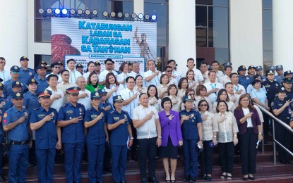 <p><strong>FIGHTING DOMESTIC VIOLENCE</strong>. Calamba City Mayor Roseller Rizal (center, in polo barong) and Executive Judge Glenda Ramos (in purple blazer) at the launching ceremonies of “Katarungan Laban sa Karahasan sa Tahanan” (Justice Against Domestic Violence) on Monday (March 18, 2024). Ramos also recently spearheaded the launch of “Dulugang Bayan,” which provides legal advice to people in dire straits. <em>(Photo courtesy of Noel Bundalian-Calamba City Press Corps)</em></p>
