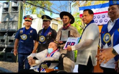 <p><strong>HERO.</strong> Private First Class Claro Daulo, 100, is conferred the World War II Service Medal during the commemoration of the 79th year of the Liberation of Panay, Guimaras, and Romblon held at Balantang Memorial Cemetery National Shrine in Jaro, Iloilo City on Monday (March 18, 2024). There are 14 WWII living veterans in Panay and Guimaras islands whose ages range from 99 to 105 years. <em>(Photo courtesy of Rena Manubag)</em></p>