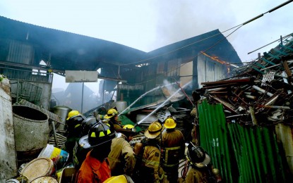 <p><strong>GUTTED.</strong> Fire volunteers help put out the fire at a residential area in Barangay Damayang Lagi in Quezon City in this March 19, 2024 photo. The BFP on Wednesday (April 3, 2024) said a total of 5,764 fire incidents were recorded from Jan. 1 to April 2 this year, an uptick from 4,477 incidents logged in the same period last year. <em>(PNA file photo by Ben Briones)</em></p>