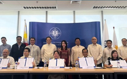 <p><strong>SIGNED IRR</strong>. Government officials show on Thursday (March 21, 2024) the signed implementing rules and regulations (IRR) of the Public-Private Partnership (PPP) Code. The IRR will take effect on April 6 this year. <em>(Photo from PPP Center)</em></p>