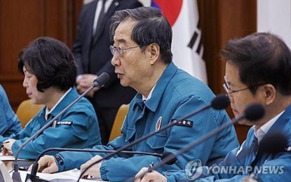 <p><strong>DEPLOYMENT.</strong> Prime Minister Han Duck-soo speaks during a meeting at the government complex in Seoul on March 22, 2024. The official said over 400 military and public health doctors will be deployed amid mass resignation of junior doctors in protest of the government’s plan to increase the medical school quota. <em>(Yonhap)</em></p>