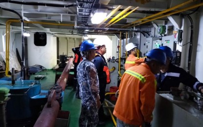 <p><strong>INSPECTION.</strong> Philippine Coast Guard (PCG) vessel safety enforcement inspectors (VSEI) check the vessel involved in dredging in Zambales on Thursday (March 21, 2024). The PCG on Friday said a total of 17 vessels out of 28 inspected vessels were detained due to a total of 344 deficiencies found by the VSEIs. <em>(Photo courtesy of PCG)</em></p>