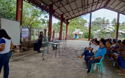 <p><strong>IMMERSION</strong>. S/Sgt. Narcy Cerilo, designated Pulis sa Barangay (Cop in the Community), speaks at an assembly in Barangay San Vicente, Baao, Camarines Sur, on Friday (March 24, 2024). Law enforcement authorities live in drug-infested communities to personally identify pressing issues and provide direct assistance, part of the anti-illegal drugs program Buhay Ingatan, Droga’y Ayawan. <em>(Photo courtesy of Baao MPS)</em></p>