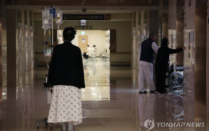 <p><strong>DOCTORS’ PROTEST</strong>. A patient walks down a hallway at a hospital in Seoul on March 24, 2024. Health Minister Cho Kyoo-hong on Monday said talks with the medical community are in the pipeline to help address the medical services problem in South Korea following the strike by junior doctors almost five weeks ago to stop the government’s plan to increase medical school enrolment. <em>(Yonhap)</em></p>