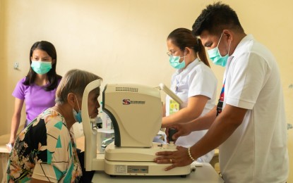 <p><strong>HEALTH SERVICE.</strong> A healthcare worker checks the eyes of an elderly patient on Friday (March 22, 2024) at the Caraga State University during the Bagong Pilipinas Serbisyo Fair (BPSF) in Butuan City. The Department of Health (DOH) fully supports President Ferdinand R. Marcos Jr.’s initiative of bringing the government closer to the people through the BPSF. <em>(Photo courtesy of DOH)</em></p>