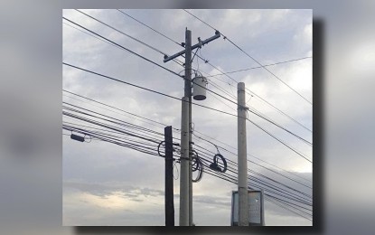 <p><strong>OUTAGES</strong>. Power lines in Bago City, Negros Occidental under the coverage area of Central Negros Electric Cooperative. Massive power interruptions occurred in most parts of Bacolod and the neighboring localities past midnight on Tuesday (March 26, 2024) due to the tripping of the transmission lines of the Central Negros Electric Cooperative (Ceneco) and the National Grid Corp. of the Philippines. (NGCP).<em> (Photo from Ceneco Facebook page)</em></p>