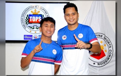 <p><strong>BRONZE MEDALISTS</strong>. Asian Games 2023 bronze medalists and sepak takraw players Jason Huerte (left) and Ronsited Gabayeron attend a press conference at the Rizal Memorial Sports Complex in Malate, Manila on Oct. 12, 2023. The two were part of the team that bagged medals in the regu and quadrant team events in Hangzhou, China. <em>(PNA photo by Jess M. Escaros Jr.) </em></p>