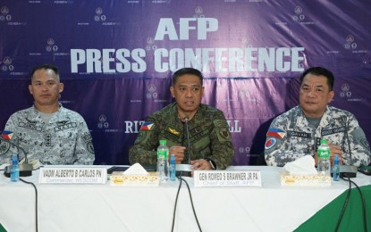<p><strong>SALUTE TO TROOPS.</strong> AFP chief Gen. Romeo Brawner Jr. (center); Philippine Coast Guard commandant Adm. Ronnie GIl Gavan (right) and Vice Adm. Alberto Carlos, Western Command commander (left), hold a press conference in Wescom headquarters in Palawan province on Tuesday (March 26, 2024). Brawner told Wescom troops to continue persevering with their rotation and reprovisioning (RORE) and other missions aimed at ensuring the country's sovereign rights despite challenges in the West Philippine Sea (WPS). <em>(Photo courtesy of the AFP)</em></p>