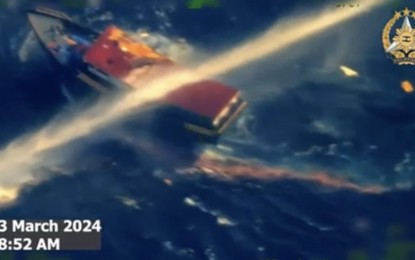 <p><strong>NOT MANIPULATED.</strong> The Philippine resupply boat Unaizah May 4 being subjected to a water cannon blast by a Chinese Coast Guard vessel as it approached the Ayungin Shoal on March 23, 2024. Media groups on Wednesday (March 27) belied the Chinese Foreign Ministry’s accusation that the journalists who covered the routine Philippine resupply missions were manipulating the materials they release to the public. <em>(Photo courtesy of AFP)</em></p>