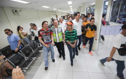<p><strong>SAFE TRAVEL.</strong> Governor Gwendolyn Garcia (right) and LTFRB-7 regional director Eduardo Montealto Jr. (center) inspect the Cebu South Bus Terminal on Wednesday (March 27, 2024). Transport officials in Cebu highlighted the need to be prepared as a key to a safe and hassle-free travel experience this long weekend. <em>(Photo courtesy of Cebu Provincial Capitol PIO)</em></p>