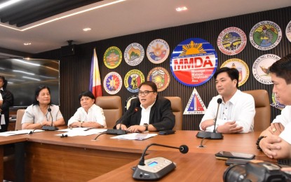 <p><strong>PENALTIES EYED.</strong> Metropolitan Manila Development Authority (MMDA) Acting Chair Romando 'Don' Artes (middle) during a press conference at the MMDA headquarters in Pasig City on Monday (April 1, 2024). The MMDA will issue a notice of violation to two companies involved in several unfinished road diggings that caused heavy traffic despite the MMDA's stipulation that such projects must be completed and roads passable by 5 a.m. on Monday. <em>(Photo courtesy of MMDA)</em></p>