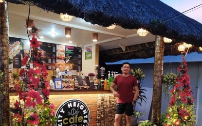 <p><strong>SCENIC COFFEE SHOP</strong>. A quaint local coffee shop, located in Highlands Park in the village of Estanza in Legazpi City, is the perfect spot for coffee lovers as it offers a panoramic view of the city's skyline and the majestic Mayon Volcano. Owned by Alexander Galicia (in photo), City Heights Cafe stands as a testament that with the right blend of marketing strategies, locally-owned cafes can make a mark in a highly a competitive caffeinated market.<em> (Photo courtesy of Alexander Galicia)</em></p>