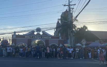 <p><strong>POLICE ASSISTANCE</strong>. Officers of Nabua Municipal Police Station in Albay provide security and assistance to devotees who attended the procession on Good Friday (March 29, 2024). The Police Regional Office in Bicol (PRO5) reported that the observance of the Holy Week was generally peaceful. <em>(Photo by Connie Calipay)</em></p>