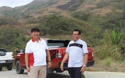 <p><strong>ROAD OPENING</strong>. Miag-ao Mayor Oscar “Richard” Garin, Jr. (left) and San Remigio Mayor Margarito Mission, Jr. conduct an ocular inspection of the remaining unpaved portion of the Iloilo road that connects to Barangay Aningalan in San Remigio, Antique, on March 24, 2024. Mission said in an interview on Monday (April 1, 2024) that the road opening will boost the tourism industry in his municipality. <em>(Photo courtesy of San Remigio LGU)</em></p>