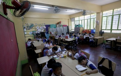 <p><strong>MORNING CLASSES ONLY.</strong> Grade 1 learners inside a classroom at the Justo Lukban Elementary School in Manila on this April 2, 2024 photo. From April 11 to May 28 this year, in-person classes in the public schools in the city will only be from 6 a.m. to 12 noon, amid high heat index levels.<em> (PNA photo by Yancy Lim)</em></p>