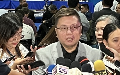 <p><strong>INTERNET VOTING.</strong> Comelec spokesperson John Rex Laudiangco speaks to media members during an interview on Tuesday at the 2nd Competitive Public Bidding for the Online Voting and Counting System (Internet Voting) in Manila. He said internet voting would the primary mode to be used for overseas voters in the 2025 midterm elections. <em>(PNA photo by Ferdinand Patinio)</em></p>
