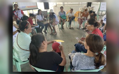 <p><strong>FAMILY DEV’T SESSION</strong>. Pantawid Pamilyang Pilipino Program (4Ps) members attend an "exit session" in Pio Duran, Albay on March 22, 2024, as a requirement for "graduation." The Department of Social Welfare and Development-Bicol listed over 19,000 households that are candidates for graduation from the 4Ps. <em>(Photo courtesy of DSWD-Bicol)</em></p>