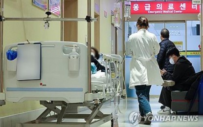 <p><strong>SIGNS OF STRAIN</strong>. A doctor enters an emergency room at a hospital in Seoul, in this file photo taken March 19, 2024. Deputy Health Minister Jun Byung-wang on Tuesday said emergency departments of major general hospitals have shown continued signs of strains as mass walkout of junior doctors, in protest to the planned hike in medical school enrolment, have entered its seventh week. <em>(Yonhap)</em></p>