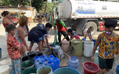 <p><strong>WATER DISTRIBUTION</strong>. The “Patubig sa Barangay” initiative of Bacolod City delivers water to residents of Barangay Taculing on Tuesday (April 2, 2024). Mayor Alfredo Abelardo Benitez said they are committed to ensuring every resident has access to clean and reliable water, especially during the El Niño. <em>(Photo courtesy of Bacolod City PIO)</em></p>