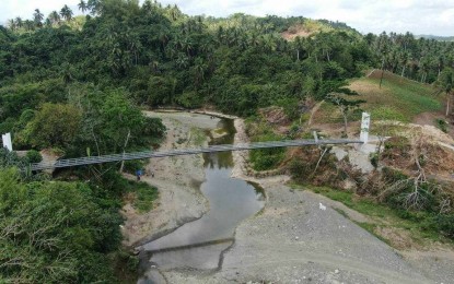 <p><strong>NEW BRIDGE</strong>. The newly-opened hanging bridge that connects Barangay San Jose of Oas town and Barangay Paulba in Ligao City, Albay province. Albay 3rd District Rep. Fernando Cabredo on Wednesday (April 3, 2024) said at least four hanging bridges in the two areas are now being used by the locals.<em> (Photo courtesy of Rep. Cabredo's office)</em></p>