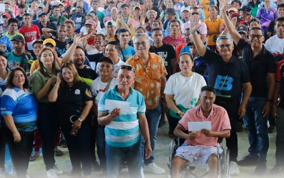 <p><strong>AID TO FLOOD VICTIMS.</strong> At least 1,838 residents from 13 barangays in two towns in Agusan del Sur received PHP9.1 million in financial assistance through the Department of Social Welfare and Development's Emergency Cash Transfer program in a series of payout activities on Tuesday (April 2, 2024). The beneficiaries consisted of families severely hit by the flooding in the province in February this year. <em>(Photo courtesy of Agusan del Sur PIO)</em></p>