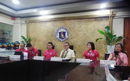 <p><strong>SUSPENDED.</strong> Department of Education (DepEd) Schools Division Superintendent Nicasio Frio (center in a barong tagalog) during a press conference on Tuesday (April 2, 2024). Frio said that based on their DepEd Order 37, the implementation of modular distance learning is being reiterated in consideration of the well-being of the learners affected by extreme climate.<em>(PNA photo by Annabel Consuelo J. Petinglay)</em></p>