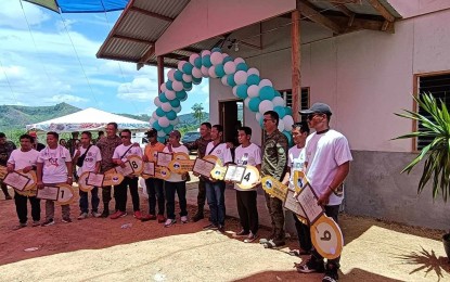 <p><strong>HOMEOWNERS.</strong> The former rebels-recipients of the housing project in San Jose de Buan, Samar in this April 5, 2024 photo. The recipients will be trained as forest rangers to protect portions of the natural forest of the Samar Island Natural Park. <em>(PNA photo by Roel Amazona)</em></p>
<p> </p>