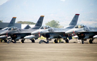 <p><strong>JET DRILLS.</strong> Some of the participating F-16 aircraft of the US Air Force in this year's Cope Thunder exercise at the Basa Air Base, Floridablanca, Pampanga on Monday (April 8, 2024). The Philippine Air Force said the drills will focus on subject matter expert exchanges and field exercises in air and ground operations, as well as logistics and other mission support planning and execution.<em> (Photo courtesy of the PAF)</em></p>