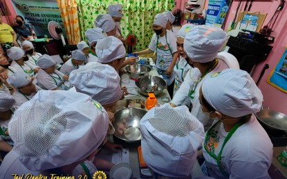 <p><strong>SKILLS TRAINING</strong>. Female persons deprived of liberty in Iloilo City train in bread making under the jail pantry training of the city government’s Technical Institute of Iloilo City last week. The city government will provide them a PHP125,000 seed capital so they can start a business inside the female dormitory of the Bureau of Jail Management and Penology. <em>(Photo courtesy of TIIC-Molo)</em></p>
