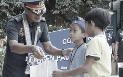 <p><strong>YOUNG HEROES</strong>. Two boys from Binangonan, Rizal were conferred the Batang Bayani Award by the Calabarzon Police Regional Office for their role in foiling a robbery. They also received scholarships and material incentives from local civic groups during awarding ceremonies on Monday (April 8, 2024). <em>(Contributed photo)</em></p>