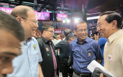 <p>MORE INFRA PROJECTS. Department of Public Works and Highways (DPWH) Secretary Manuel Bonoan (right) at <span class="x193iq5w xeuugli x13faqbe x1vvkbs x1xmvt09 x1lliihq x1s928wv xhkezso x1gmr53x x1cpjm7i x1fgarty x1943h6x xudqn12 x3x7a5m x6prxxf xvq8zen xo1l8bm xzsf02u x1yc453h" dir="auto">the Bagong Pilipinas Town Hall Meeting on Traffic Concerns at FilOil EcoOil Centre in San Juan City on Wednesday (April 10, 2024). DPWH) bared several big-ticket projects being constructed by the government in a bid to decongest traffic in Metro Manila.</span> <em>(PNA photo by Joan Bondoc) </em></p>