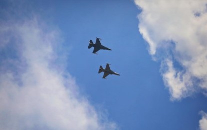 <p><strong>BASIC FIGHTER MANEUVERS.</strong> PAF FA-50 and USAF F-16 jet fighters conduct basic aerial combat maneuver exercises during the Cope Thunder Philippines (CT 24-1) on Thursday (April 11, 2024), over the Basa Air Base, Floridablanca, Pampanga. The BFM refers to tactical maneuvers performed by fighter aircraft during air combat maneuvering to gain a positional advantage over opposing combat planes.<em> (Photo courtesy of the PAF)</em></p>