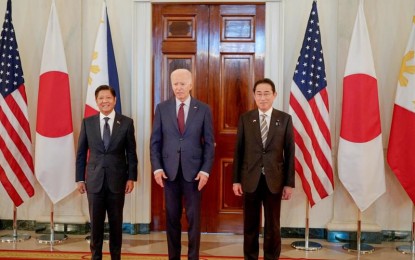 <p><strong>HISTORIC TRILATERAL SUMMIT.</strong> President Ferdinand R. Marcos Jr. (left) attends the landmark trilateral summit with United States President Joe Biden and Japanese Prime Minister Fumio Kishida at the White House in Washington, D.C. on April 11, 2024, Manila time. During the meeting, Marcos forged a stronger trilateral alliance with Biden and Kishida to protect the Indo-Pacific region. <em>(Photo from the Presidential Communications Office)</em></p>