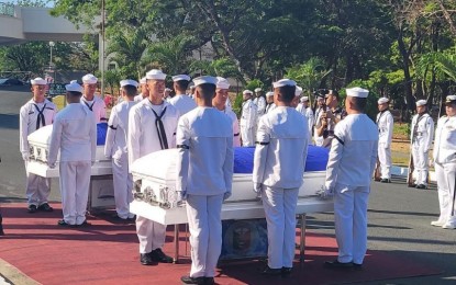 <p><strong>FINAL RESPECTS.</strong> Philippine Navy troops pay tribute to the late Lt. Jan Kyle Q. Borres and Ensign Izzah Leonah S. Taccad at the Libingan Ng Mga Bayani, Fort Bonifacio, Taguig City on Friday (April 12, 2024). The two Navy pilots were killed when their training aircraft crashed in Cavite City on April 11. <em>(Photo courtesy of the PN)</em></p>