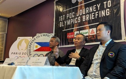 <p><strong>OLYMPIC TALK</strong>. Philippine Olympic Committee (POC) president Abraham "Bambol" Tolentino (center) presides over the first POC Journey to Olympic briefing at the Milky Way Restaurant in Makati on Friday (April 12, 2024). With him are Team Philippines chef de mission Jonvic Remulla (left) and POC secretary-general Atty. Wharton Chan. <em>(Contributed photo) </em></p>